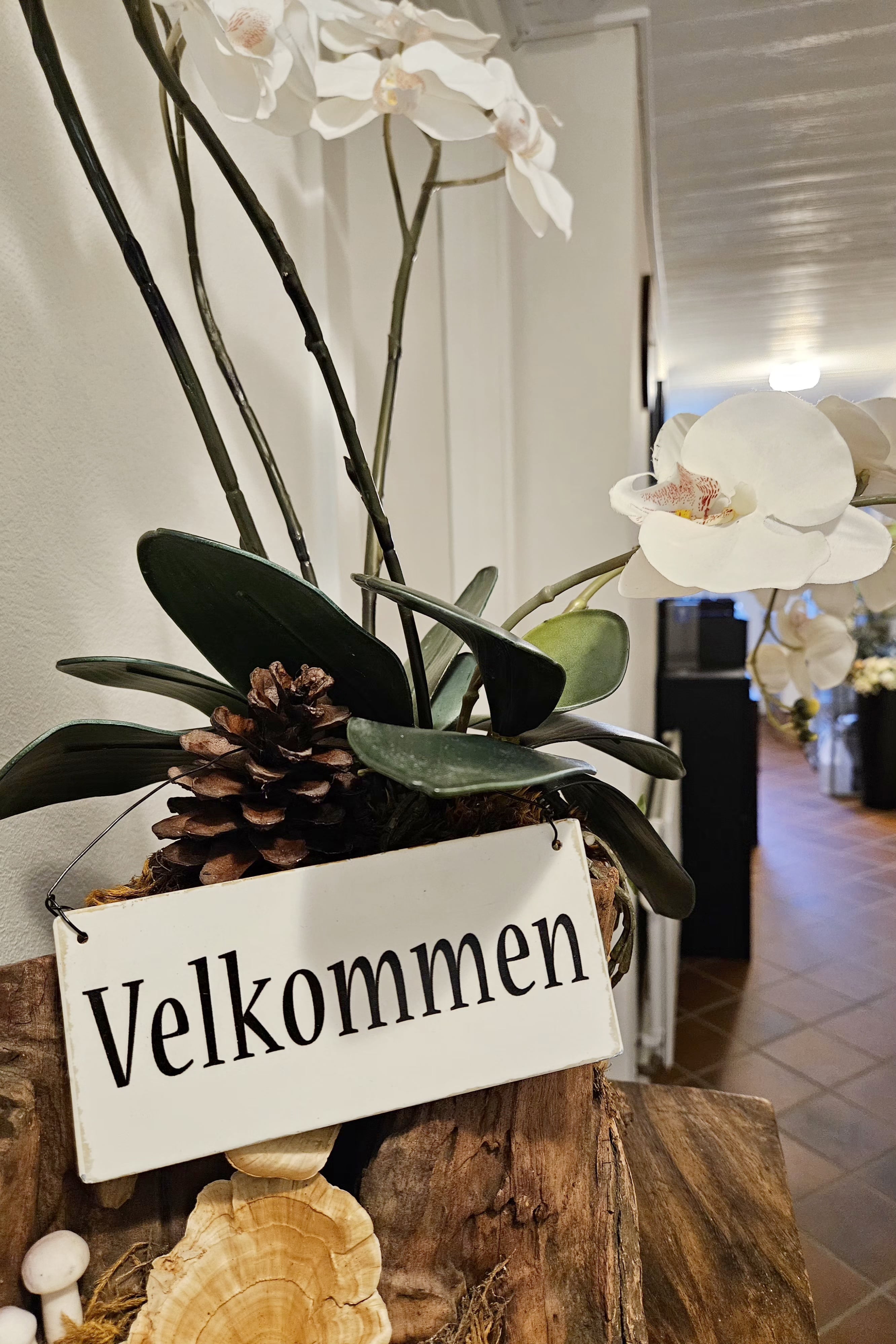Billede af et velkomstskilt i butikken